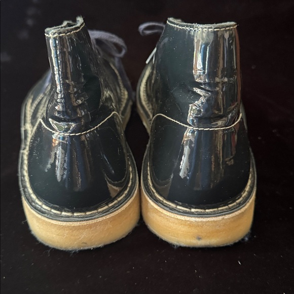 Clark’s Black Patent Leather Desert Boots.